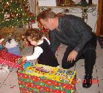Miranda and Dad dig thru gifts 